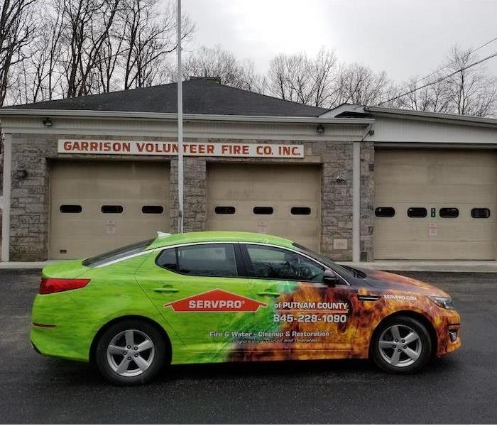 SERVPRO Car in front of a firehouse
