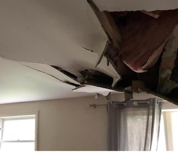 Ceiling caving in from winds and rain